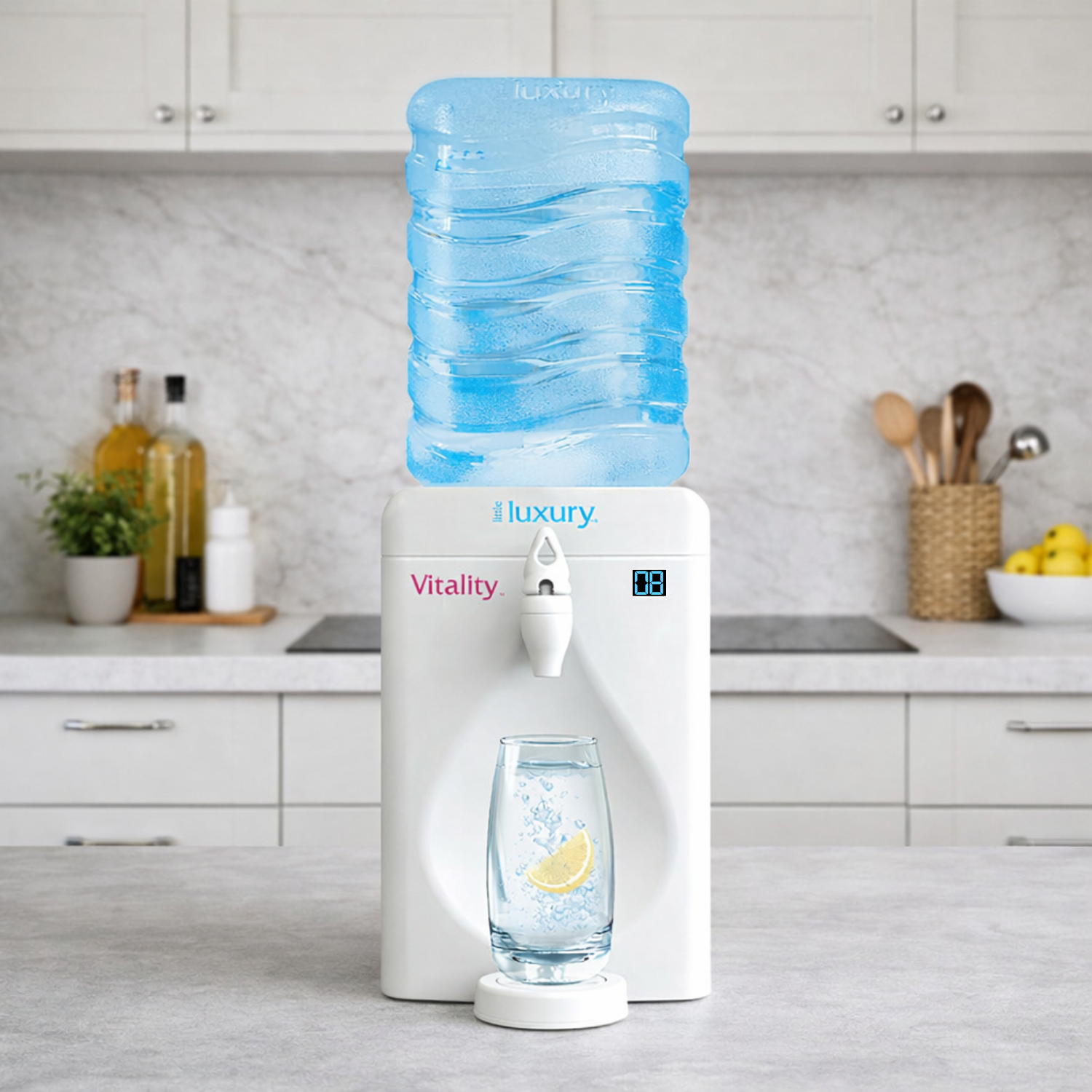 Little Luxury Vitality Mini Water Cooler with blue reusable water bottle in a modern kitchen